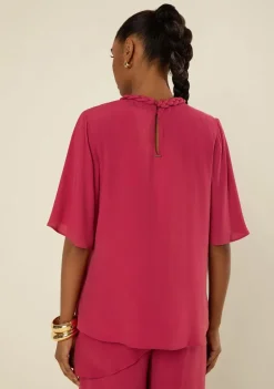 Blusa Morena Rosa Solta Decote Careca Manga Curta Padrão Rosa